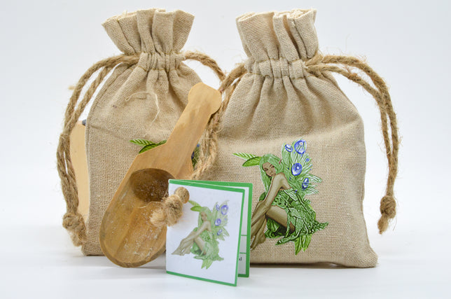 Two bags of natural bath soaks with wooden scoop